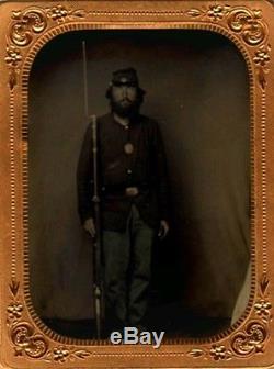 4th plate tintype of civil war soldier, and 6th plate tintype of wife and kids