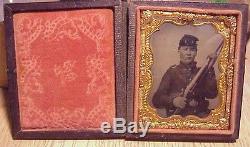 CASED TINTYPE ARMED CIVIL WAR SOLDIER with EARLY WAR UNIFORM & MUSKET