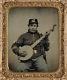 CIVIL WAR PHOTOGRAPH Unidentified soldier in Union cavalry uniform with banjo