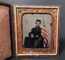 CIVIL WAR UNION SOLDIER AMBROTYPE WITH FLAG & KNIFE PHOTOGRAPH