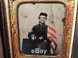 CIVIL WAR UNION SOLDIER AMBROTYPE WITH FLAG & KNIFE PHOTOGRAPH