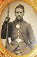 Civil War Soldier 1/6 Plate tintype very serious and focused, with musket