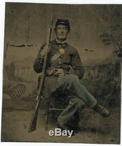 Civil War Soldier Tintype with Musket and Revolver