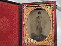 Civil War quarter plate tintype of Union soldier in winter garb with huge pants