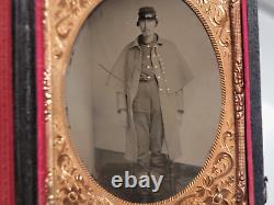 Civil War quarter plate tintype of Union soldier in winter garb with huge pants