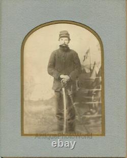 Civil War soldier posing with sword US flag in background antique albumen photo
