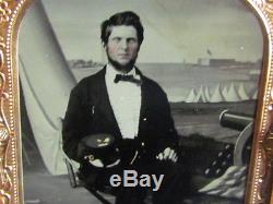 Civil War soldier sitting in front of great looking camp backdrop tintype photo