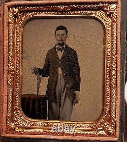 Civil War tintype of soldier with great shot of Remington revolver tinted table