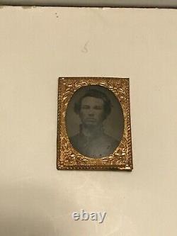 Miniature Civil war soldier tin type photo with red tinted cheeks copper frame