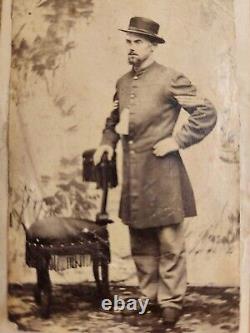 One tough looking Sergeant, standing view Cdv of unidentified soldier in a frock