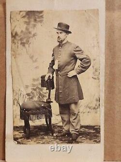 One tough looking Sergeant, standing view Cdv of unidentified soldier in a frock