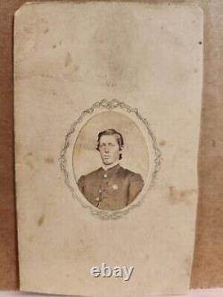 Oval CDV bust view of a Union soldier wearing 6th Corps badge