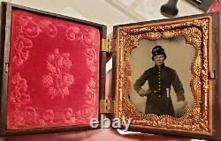 Sixth plate ambrotype of double armed cavalry soldier with knife and small gun