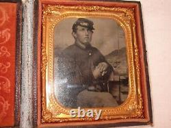 Tintype Civil War soldier with kepi and American flag