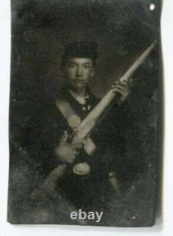 Tintype of a CIVIL WAR Soldier with a GUN and Gilding